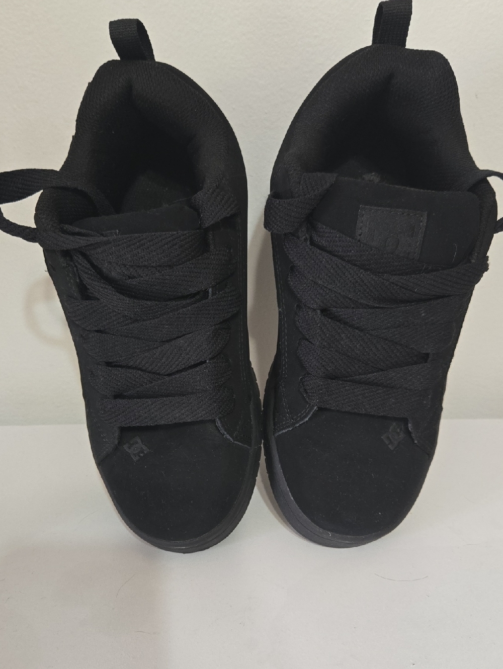 DC black and white shoe label detail